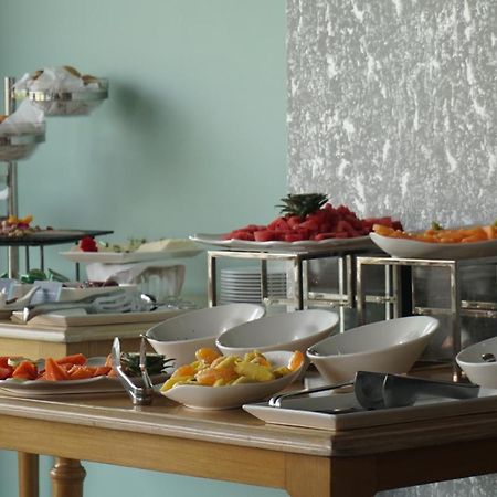 Quo Quality Hotel マニサレス エクステリア 写真 A buffet