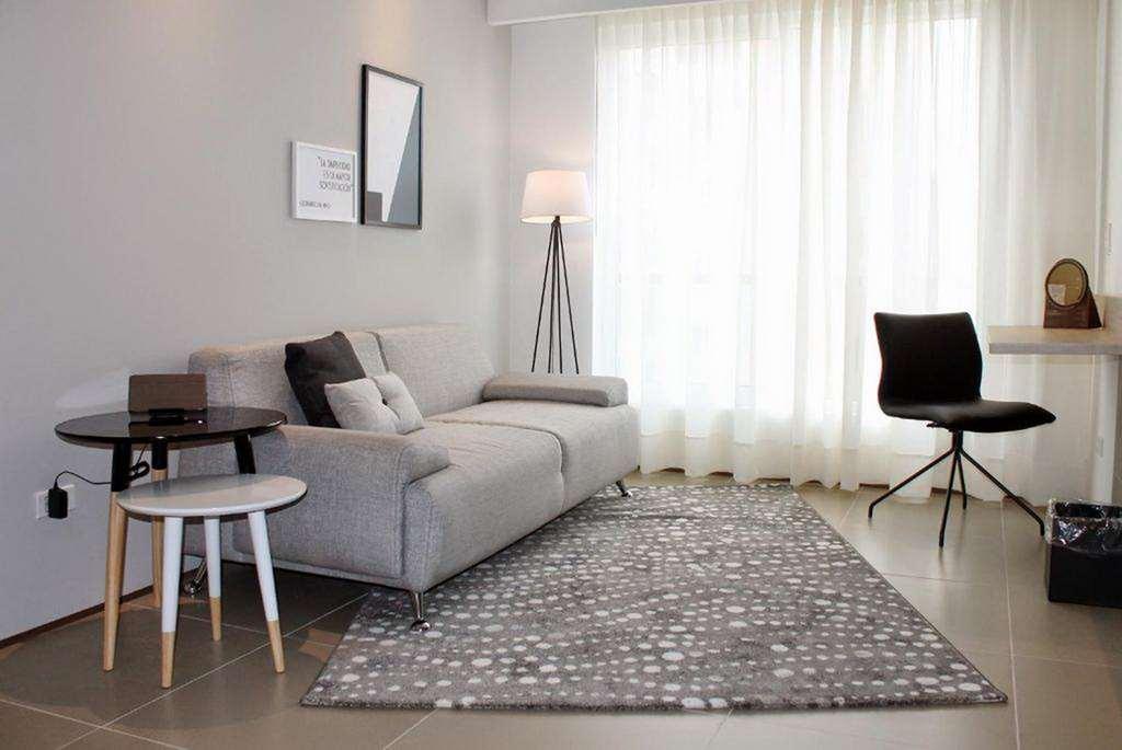 Quo Quality Hotel マニサレス 部屋 写真 A living room with a rug