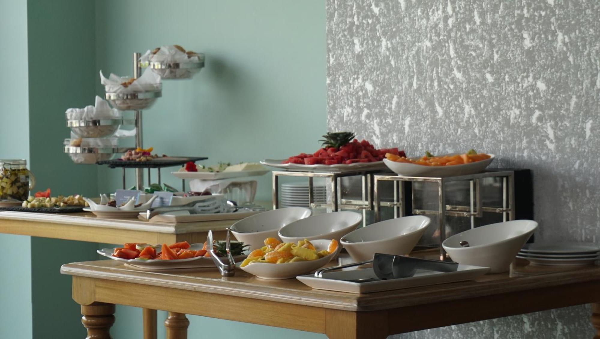 Quo Quality Hotel マニサレス エクステリア 写真 A buffet