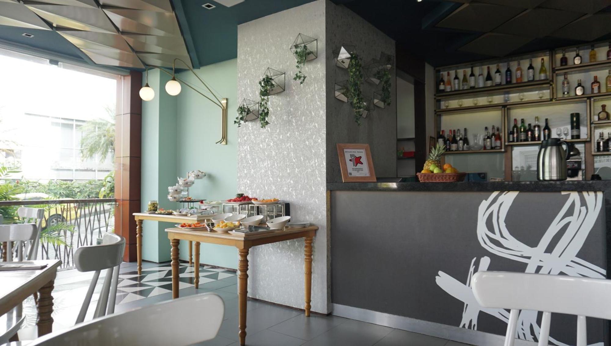 Quo Quality Hotel マニサレス エクステリア 写真 The interior of the restaurant
